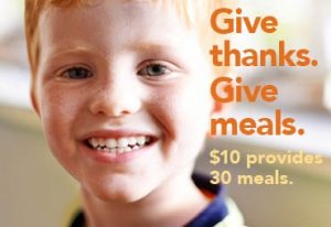 give thanks give meals. $10 provides 30 meals. a young person with freckles smiles